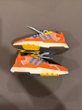 Adidas Kids Orange Athletic Sneakers with Blue Stripes